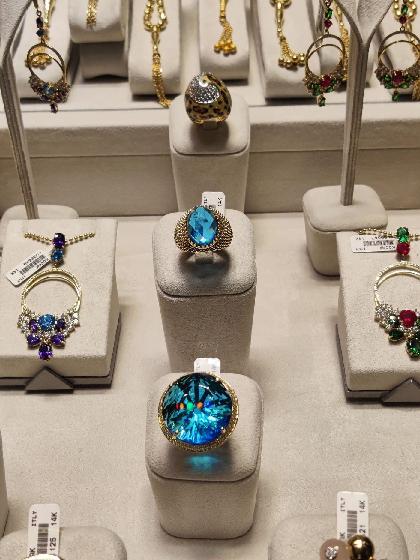 Jewellery displayed in a counter case